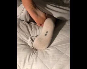 I Take Off My White Socks in Bed After a Hard Day