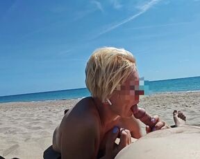 Blowjob on a public beach