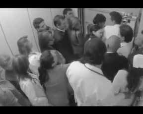 Doctor Gropes Nurse In Elevator Full Of People