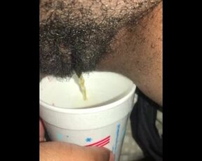 Hairy Pussy Pissing in Sonic Cup with Left over Fruit in it